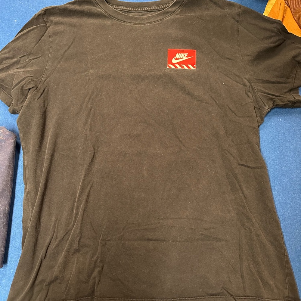 Nike Men's Black Tee with Red Logo